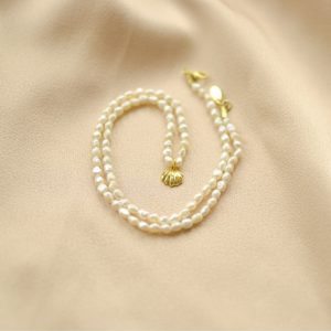 collar de perlas y miniconcha-blingbling